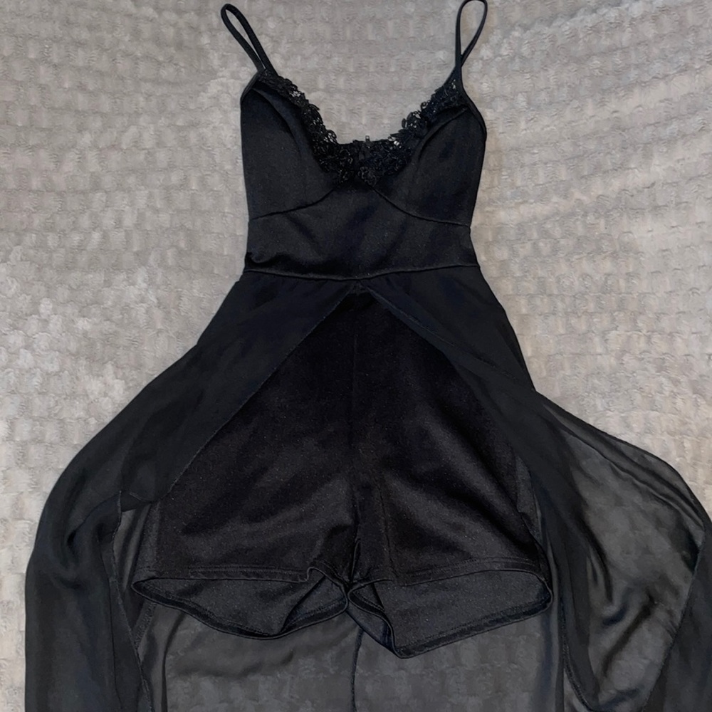 Black lace romper with a nice high to low back skirt drop